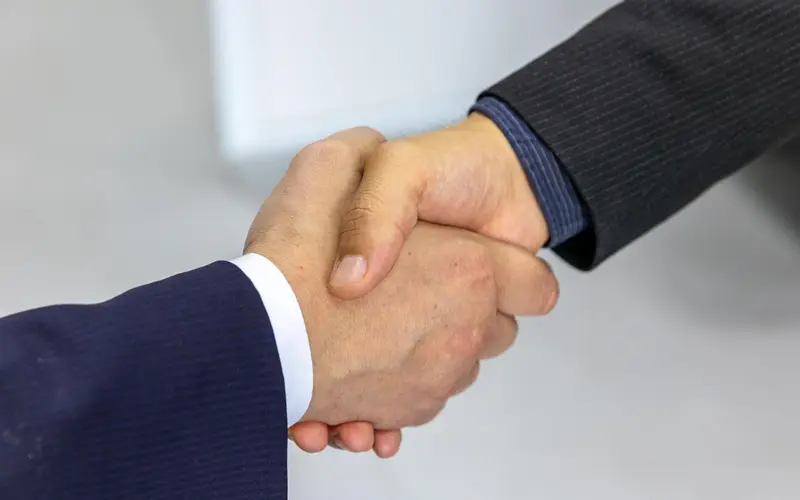 A partnership deck and brand collateral for a bilateral trade council